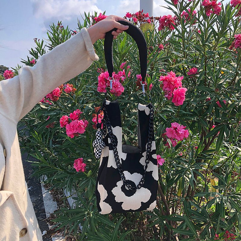 women's white and black floral bag