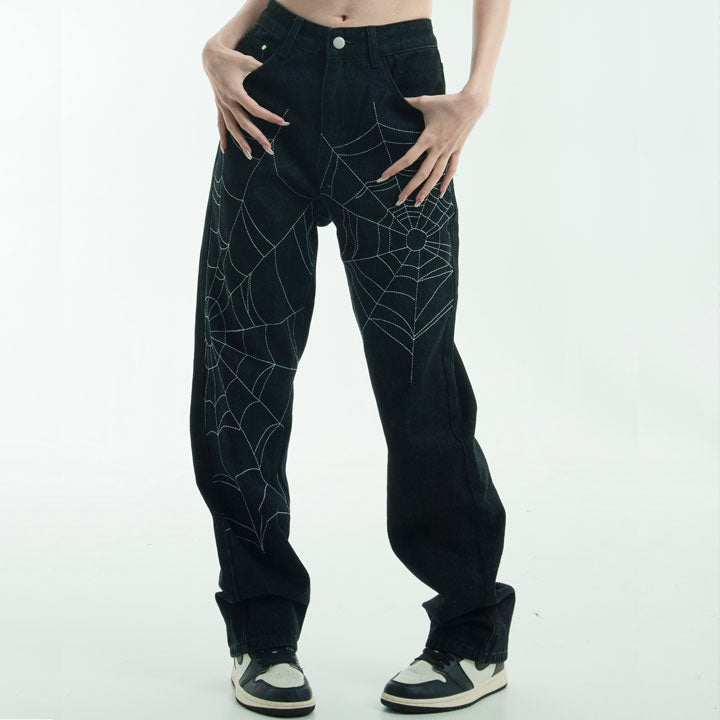 black jeans with spider web print