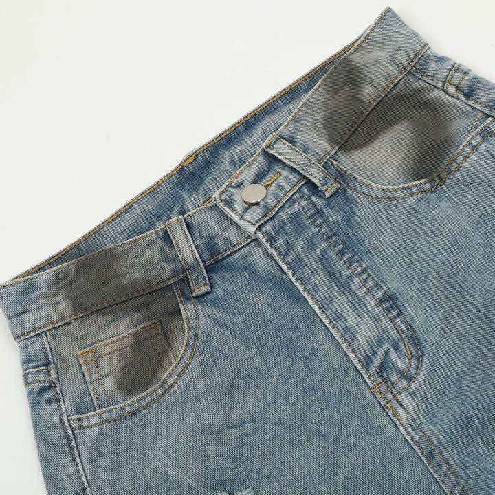 washed jeans with worn print
