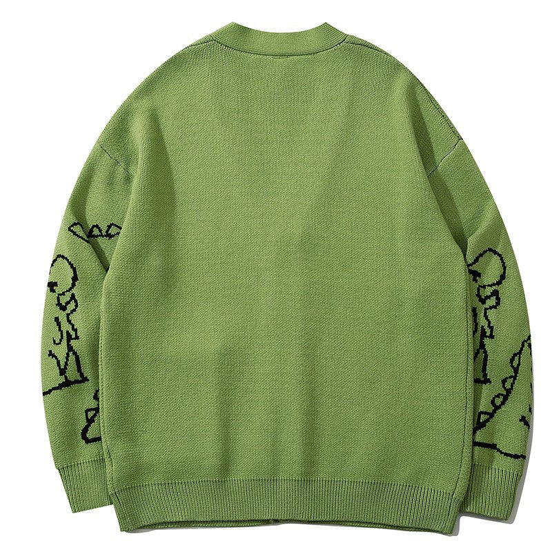 green dinosaur cardigan sweater
