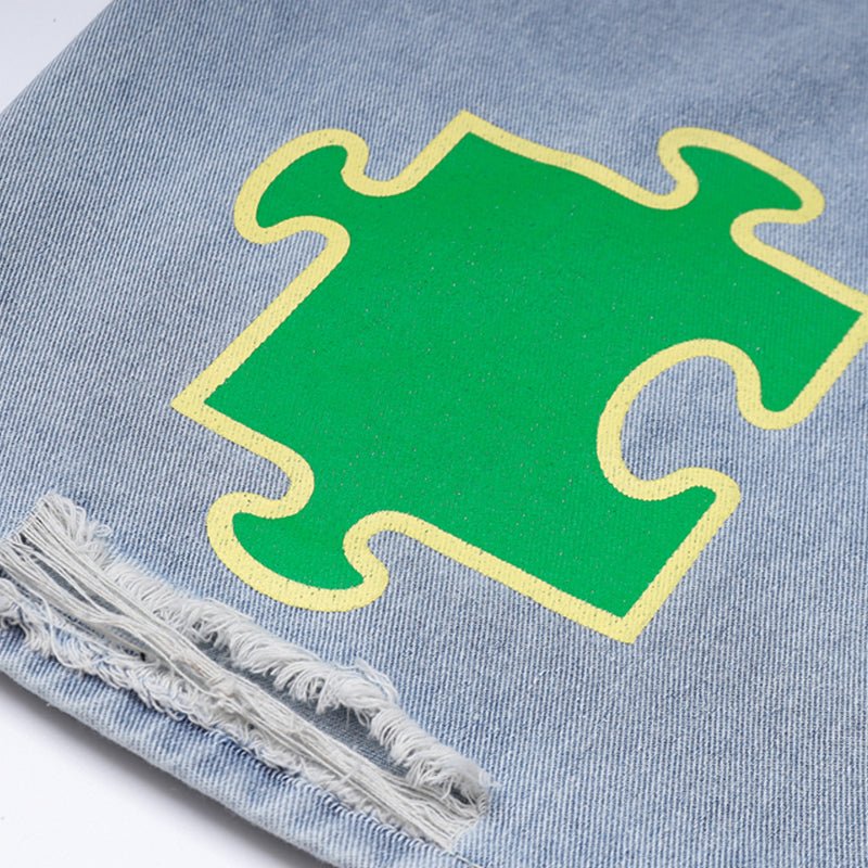 blue denim short with green puzzle print