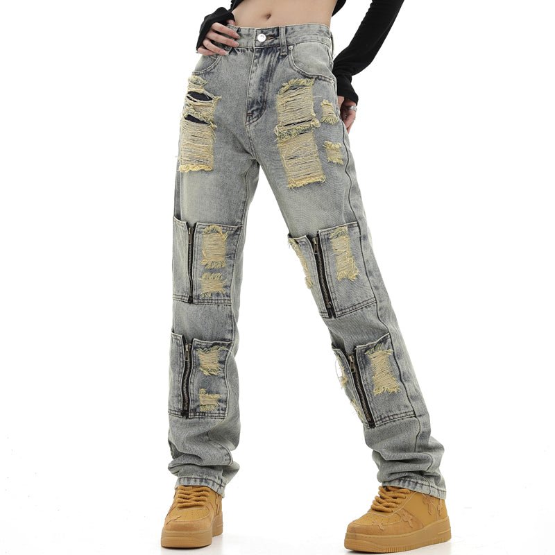 women ripped jeans with zip up holes