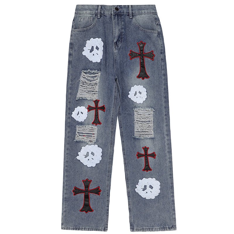 ripped jeans with cross