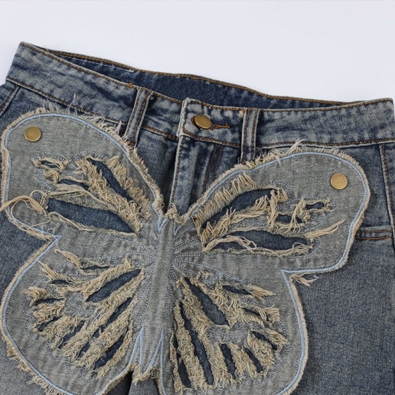 washed butterfly jeans