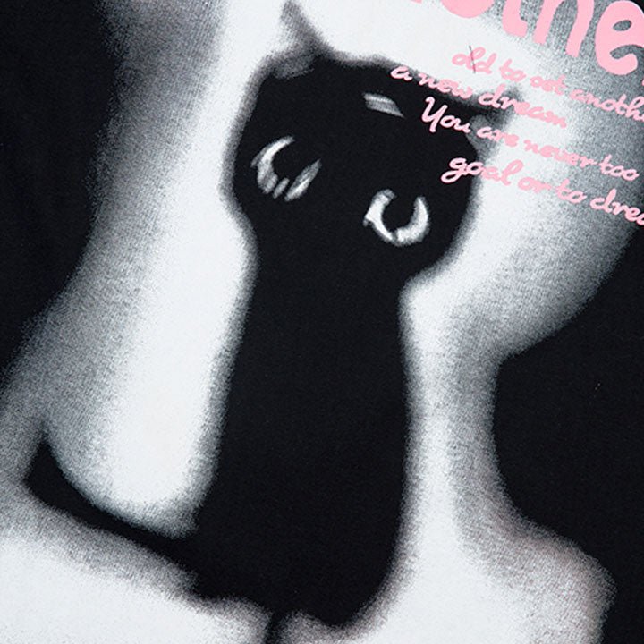 black T-shirt with innocent cat print