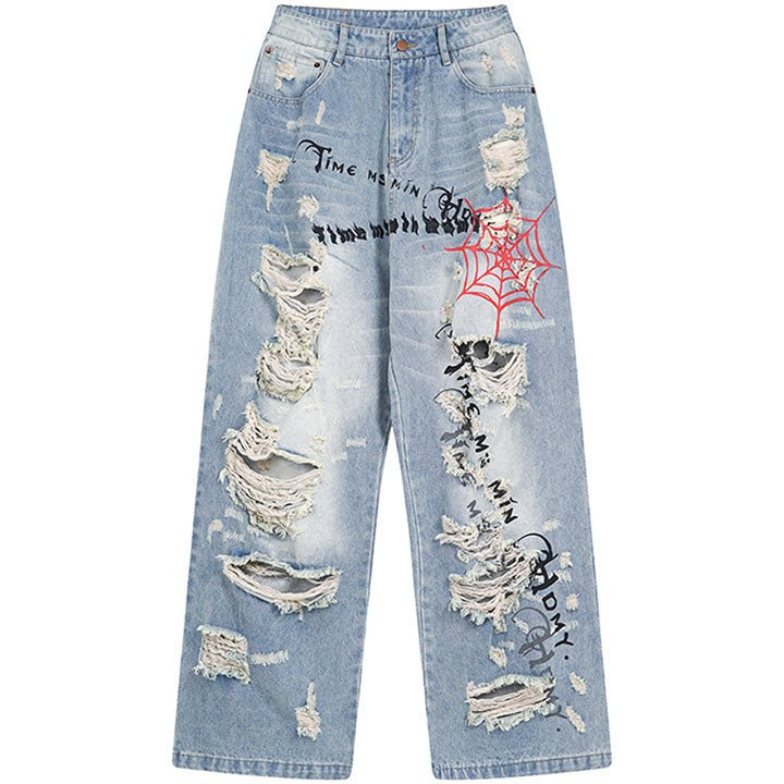 ripped spider web jeans